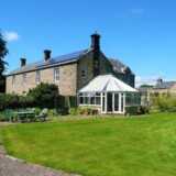 Custom glass roof conservatory installation in the North of England